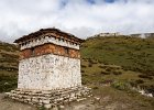 Lingshi chorten , with the monastery on the hill in the background