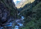 Trek to Rechi up a narrow gorge on a trail through bamboo and conifer forests