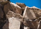 Mani stones at the Phoksumdo monastery with the incredibly blue lake in the background