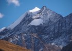 Striated, snow capped mountain peak (which may be Norbu Kang?) near Ringmo.