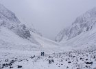 Trevor and Maeve trekking through the bleak winter landscape just below Snowfields camp