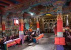 Monks and villagers chanting buddhist texts in Saldang monastery