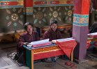 Monks and villagers chanting buddhist texts in Saldang monastery